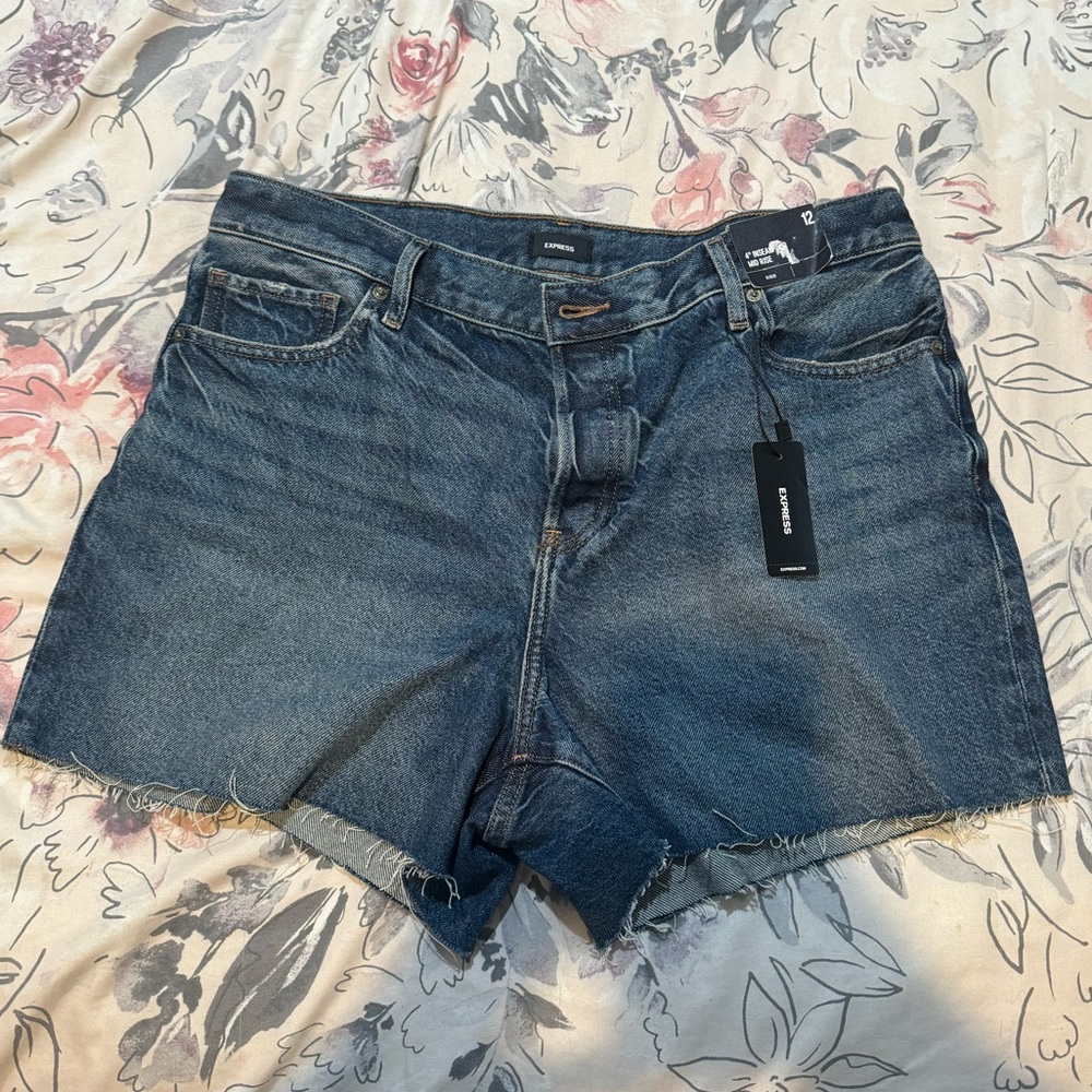 NWT express Medium Blue mid rise Denim Cutoff Shorts